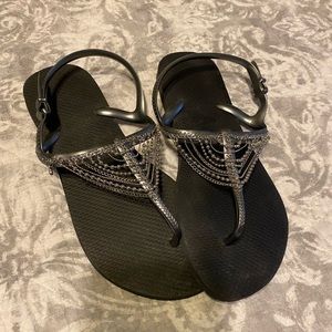 Black sandal with silver embellishments